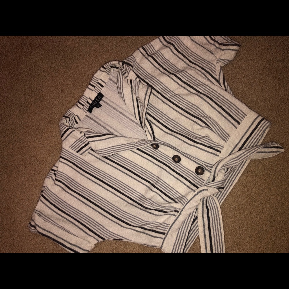 T•I•M•I•N•G button down shirt.